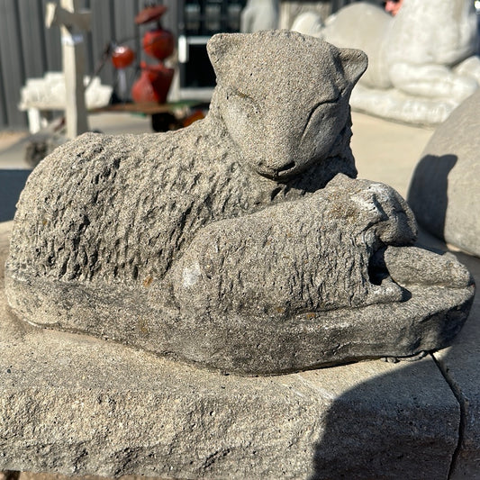 Resting mom and baby sheep statuary