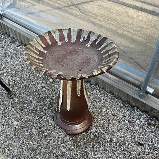 Rustic red and cream birdbath